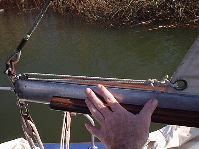 enough room left on the boom for outhaul tensioning,  important on old sails, and corrected wrinkles you can see in earlier photos