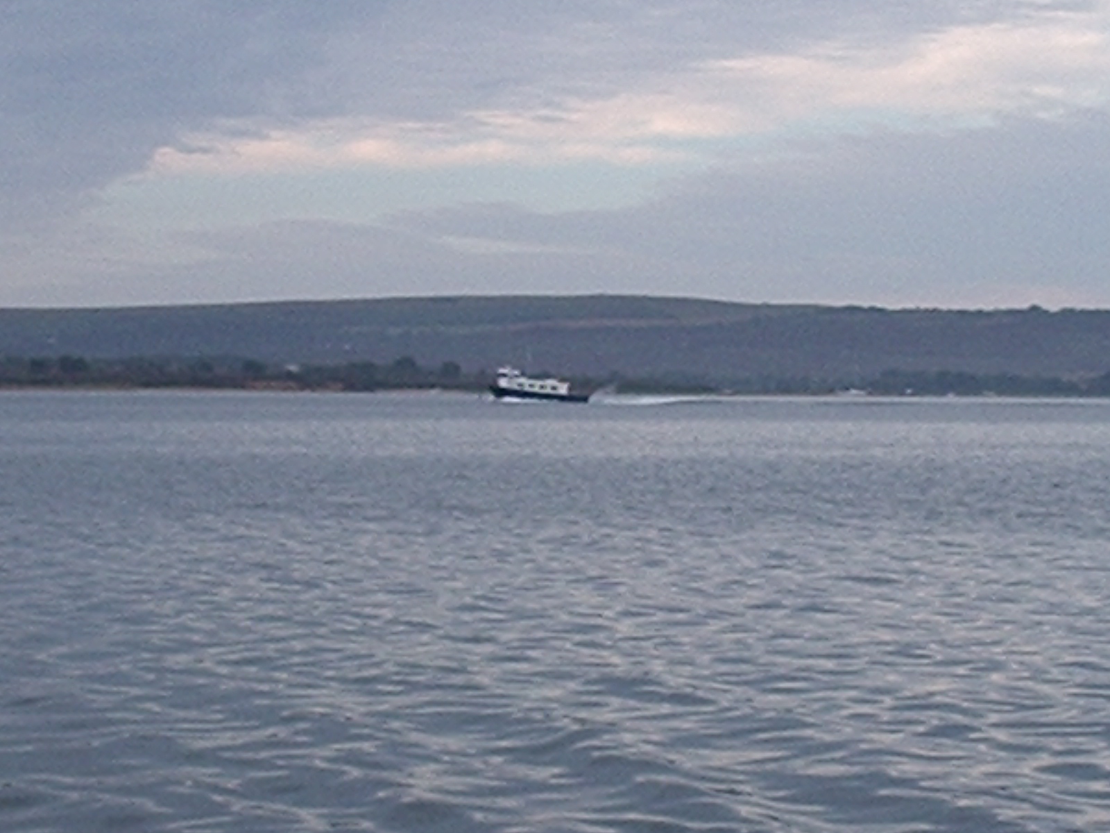 Furzey Ferry riding up its huge bow wave about 20 knots